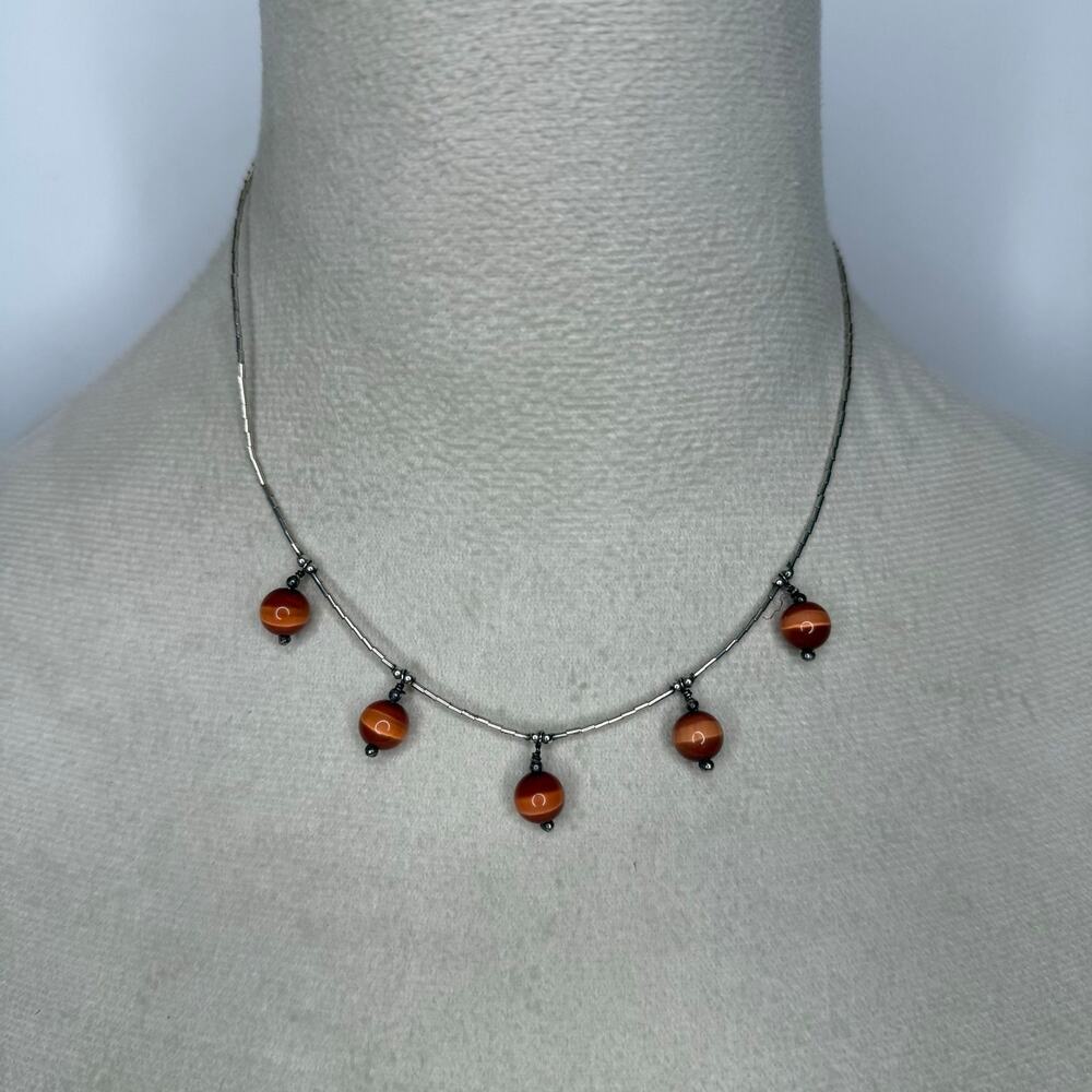 07. Dark orange cats eye beaded necklace